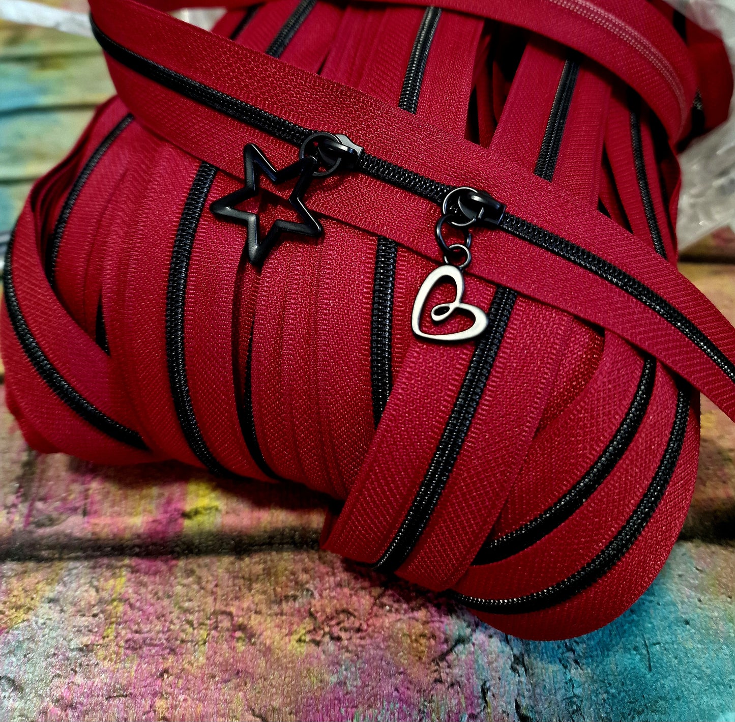 Size 3 Zipper tape RUBY RED WITH MATT BLACK TEETH