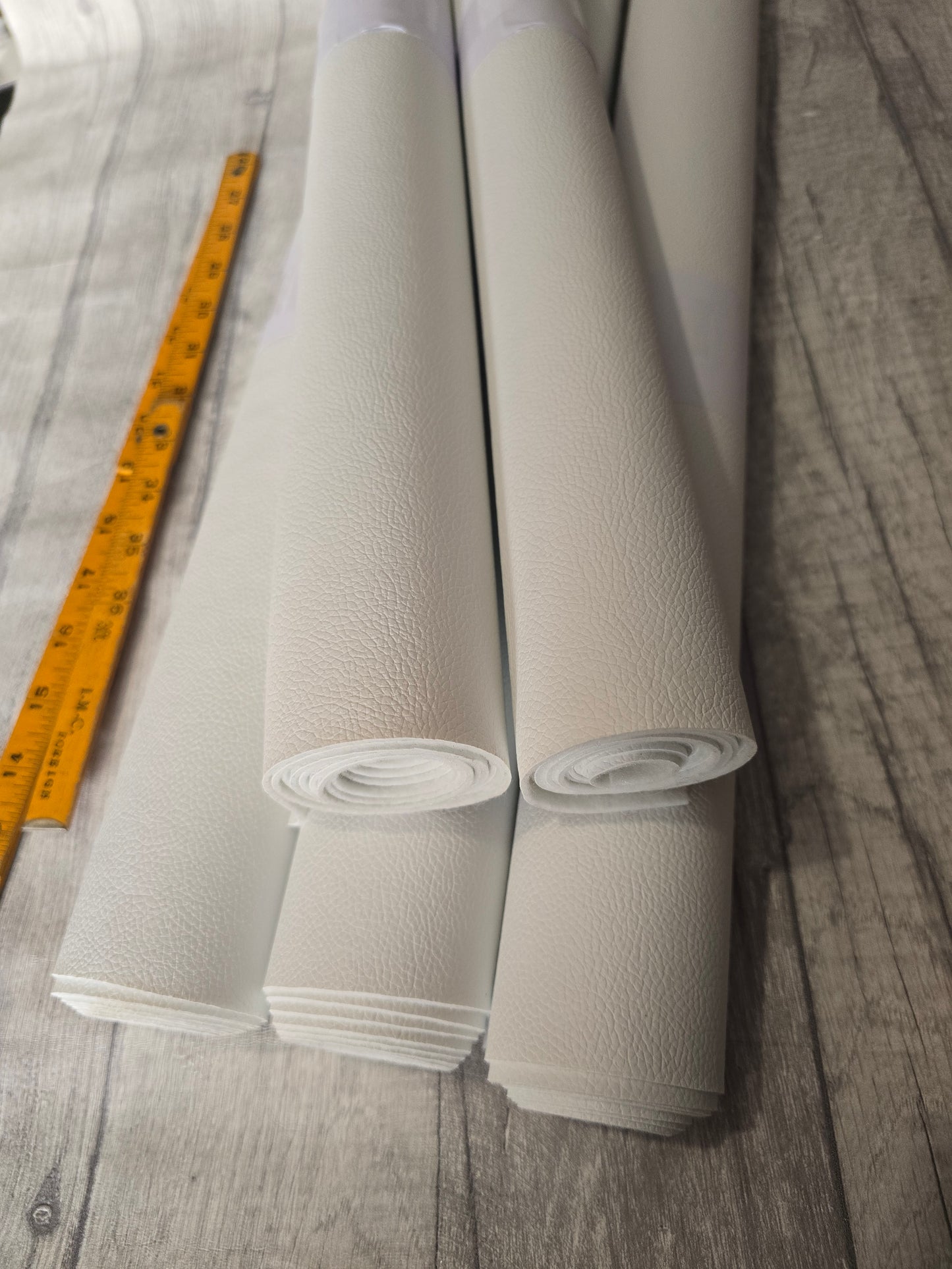 Brilliant White Faux leather felt backed half metre