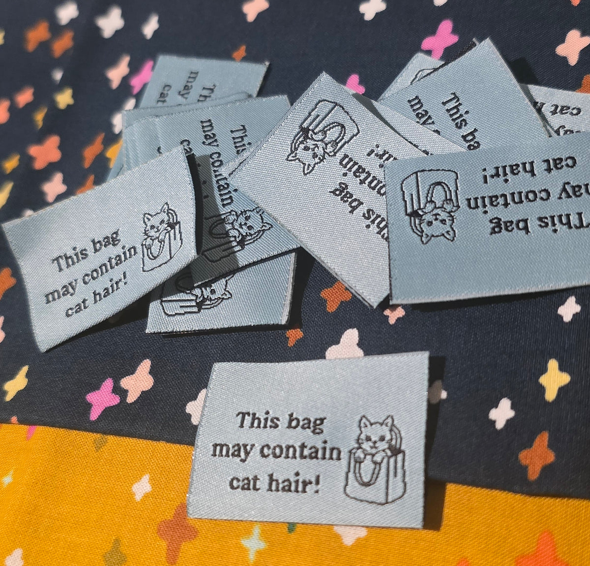 FUN labels MAY CONTAIN CAT HAIR